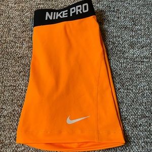 Orange Nike Dri-Fit athletic shorts-Size Medium